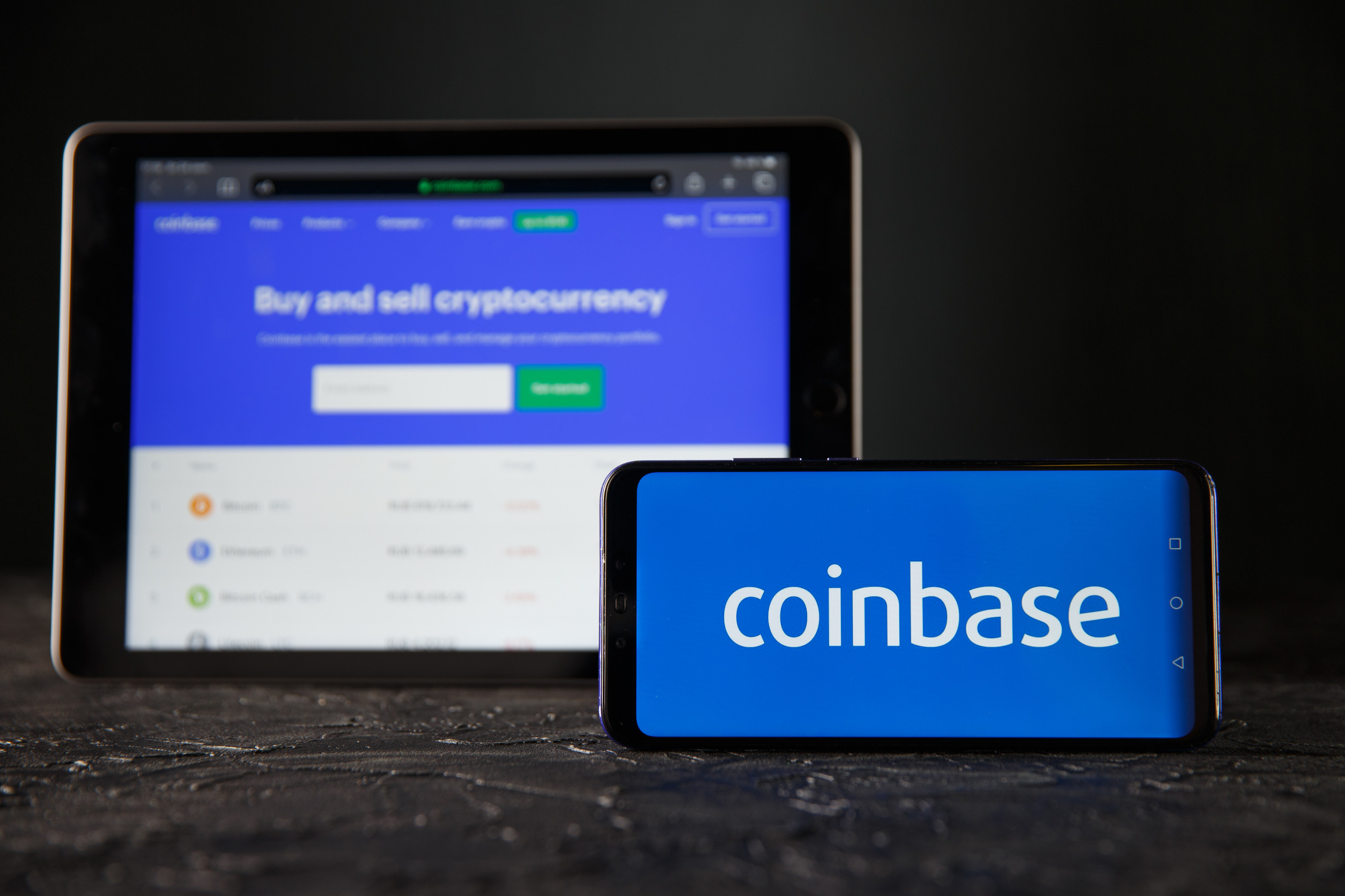 Cathie Wood boosts stake in Coinbase stock despite SEC lawsuit